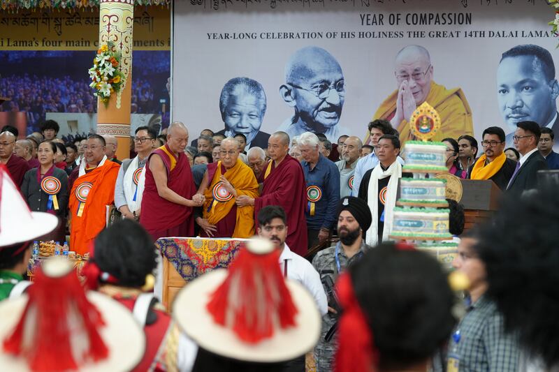 Tibetan spiritual leader the Dalai Lama arrives at the stage during celebrations on the 90th birthday of the Dalai Lama at the Main Temple in Dharamsala, India, July 6, 2025.
